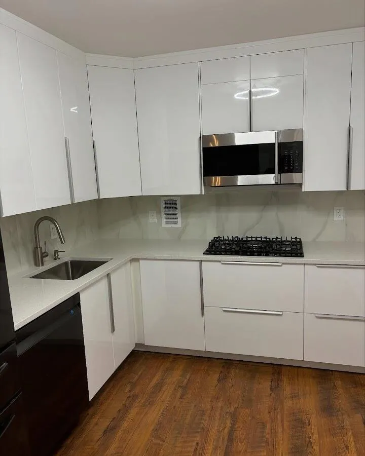 Restored kitchen with white cabinets after water damage in Lenox